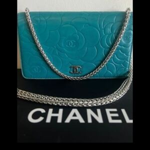 CHANEL Turquoise Floral Embossed Clutch